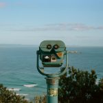 Image of binoculars looking out to sea